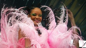 Rihanna Spotted in Massive Pink Feathers At Crop Over in Barbados | Essence
