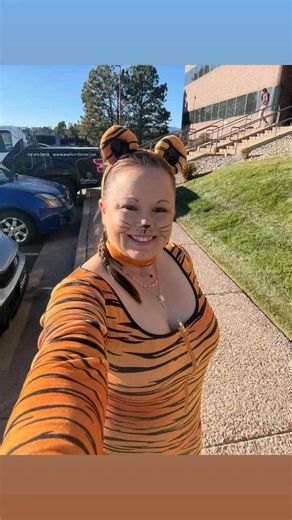 I hardly ever dress up for Halloween, but I was inspired to have a little fun this year. Everyone at my BNI group was impressed that even as a visitor I showed up in style. I even got Josh a matching tiger costume for our events this weekend. Why not have a little fun? I basically trick-or-treat for money every day, but I don’t get to dress up! | Amber Rose Castellon