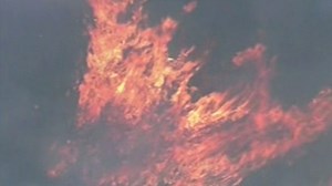 Crews fight wildfires