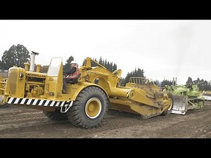 Euclid TC-12 Bulldozer Pushing a 1961 Caterpillar DW21 Scraper