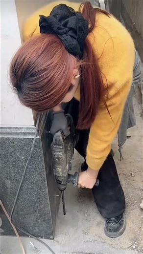 Female worker drilling holes.#tools #diy #powertools