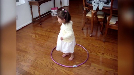 That's a new hula hoop technique. | America's Funniest Home Videos
