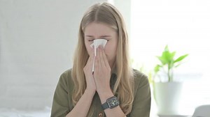 clip-1094761583-sick-young-blonde-woman-coughing-having-flu