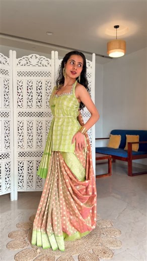 𝐀𝐫𝐜𝐡𝐞𝐞 | Saree Drapes on Instagram: "Save and send this to a saree lover 🪷 | Saree with Short Kurti- it’s definitely giving punjabi princess core 🪷 Pure silk saree of the day- is a handloom khaddi georgette katan banarasi. The saree gets its royal sheen from katan silk and the water like flow from georgette. 🪷 How to wear a saree with short kurti- 🪷 Choose a weightless flowy pure silk sarees fabric- katan silk, tussar silk, mulberry silk, khaddi chiffon, khaddi georgette, mysore silk. 