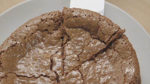 Ina Garten's Bittersweet Chocolate Cake has a little instant coffee to bring out the rich chocolate flavor 🥰 Subscribe to discovery to stream more episodes of #BarefootContessa: https://links.discoveryplus.com/HQy6sEaxygb. #discoveryplus Get the recipe: https://foodtv.com/3KYyGwA | Food Network