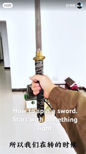 How to spin a sword. Start with something lighter.