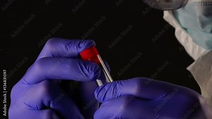 Forensic scientist with evidence tube during crime scene investigation