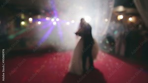 Bride and groom dancing the first dance at their wedding day