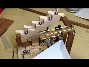 Ball distribution mechanism