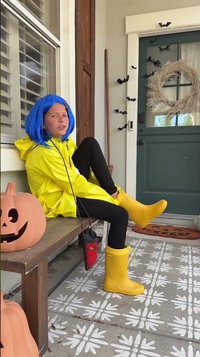 Yellow rain boots that double as a Halloween costume AND they’re easy-on so I don’t have to tug her