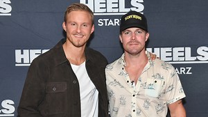 Stephen Amell and Alexander Ludwig spoke about HEELS returning to STARZ, what to expect from the second season, the camaraderie on the set, what working with AJ Lee was like, Sting, adding depth to their characters and more. This HEELS Roundtable featured a panel of: Bill Pritchard of WrestleZone.com, Jeremy Lambert of Fightful.com, Mike Johnson of PWInsider.com and Brian Jones of PopCulture.com. | WrestleZone | Facebook