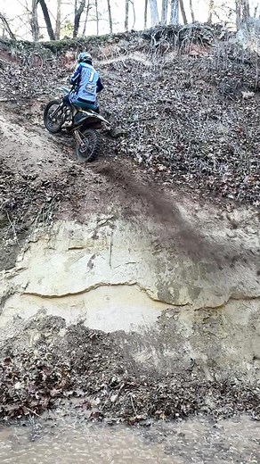 Dirt Bike Riding Through Rugged Terrain Adventure