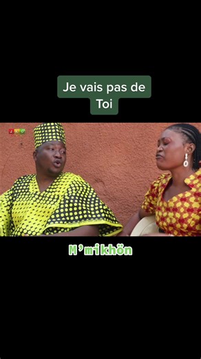 Traditional African Attire Conversation in Outdoor Setting