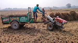5.6K views · 149 reactions | Paddy loaded power tiller trolley coming out from field | Kamco er90 with trolley in paddy field | Power Tiller BD & Machinery Tools | Facebook