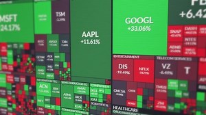 Stock icons on the stock market fall in price and turn red