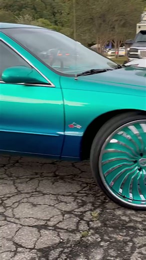 Candy teal Impala SS on 26’s Forgiatos riding