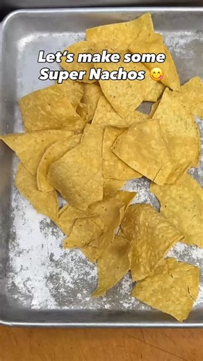 POV: You just found out how Super Nachos are made 👀 . . . . #nationalnachoday #nachos #supernachos #comfortfood #cheesygoodness #eatlocal #instafood #reels #explore | Tully's Good Times