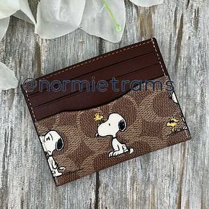 Coach X Peanuts Slim Id Card Case In Signature Canvas With Snoopy Print Wallet