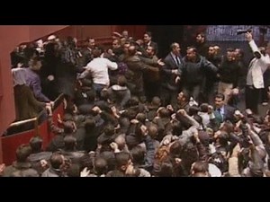 Syria's President Assad mobbed by supporters after speech