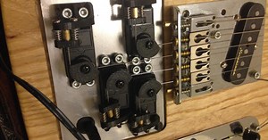 Tele Servo Bender emulates a lap steel sound using servos
