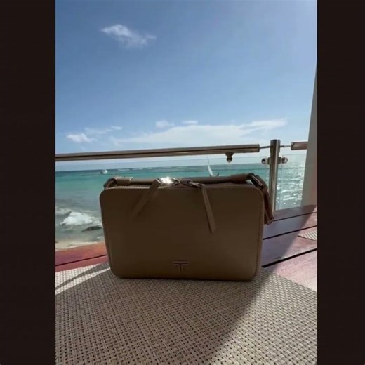 tumi crossbody beige1