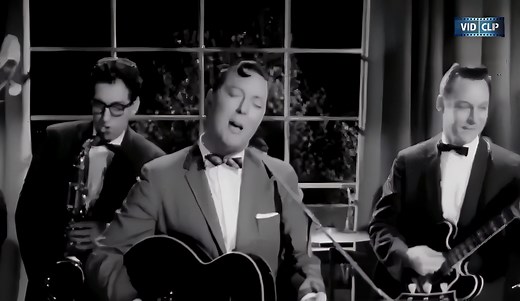 Bill Haley & His Comets - Shake Rattle And Roll (1954) "Shake, Rattle And Roll," originally by Big Joe Turner and reimagined by Bill Haley & His Comets in 1954, stands out in the 1950s musical landscape. Haley's version added a polished rock 'n' roll edge to the song, broadening its appeal and cementing its place in music history. This track embodied the free spirit and rebellious energy of the era, with lyrics that were playful and sometimes risqué. It represented both a nod to traditional rhyt