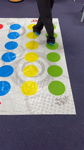 TWISTER MAT CROSS WALK I love using the TWISTER mat as a visual prompt. The coloured circles provide a clear way to help children to plan their thoughts and organise their bodies. It also provides a beginning and end point which some children really appreciate. We have been using the mat in a variety of gross motor and sensory motor actions. One way we have used the mat is to practice “cross walks”. I don’t actually know if there is a proper name for this movement but I’m sticking with “cross wa
