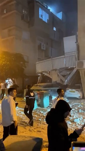 Building collapses after Iranian missile strike on Israel