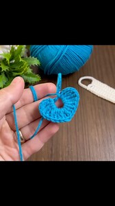Heart Button Crochet Cable Organizer 💗🧶 | Cute & Functional DIY! Messy cables? Not anymore! I crocheted this adorable heart-button cable holder to keep my cords tidy and cute at the same time. 🧵✨ It’s small, sweet, and super functional — the perfect scrap yarn project for crochet lovers. This handmade cable wrap is great for headphones, chargers, or even desk decor. Love organizing in style? This one’s for you! 💡 Would you use this? 🧶 Drop a 💗 if you want the pattern! #CrochetDIY #CableOrg
