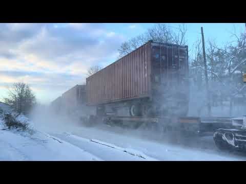 CSX 3290 ET44AH leads CSX I030 dashing in the snow at Piscataway 