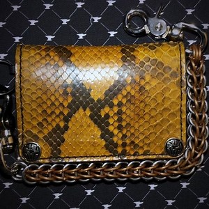 12 reactions | JUST LISTED: I’ve always loved this Coffee #Python hide.....here we have it made into a Mini Long #AnvilWallet. Very nice small sized #bikerwallet for any pocket, just 5x3” & comes with #walletchain attachment point. #pythonwallet #snakeskin #exoticwallet #ryantheanvil | Anvil Customs Leather | Facebook