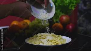 Water boils in a saucepan as nests of thin pasta are added to cook delicate spaghetti. Thin spaghetti noodles in the shape of a nest. instant noodles. pasta nests. Cooking process Step by step