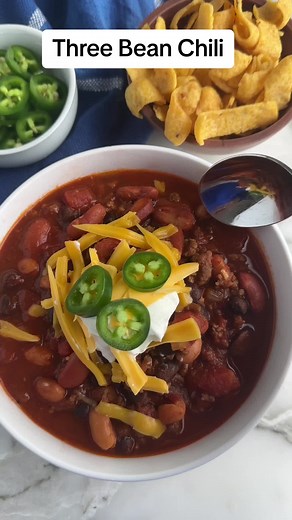 This easy three bean chili recipe can be made with just a few simple ingredients. A hearty chili that is sure to warm your tastebuds and belly. This chili recipe is just what you need for a cold evening meal. Try topping with cheese, and sour cream. #chilirecipe #beanchili #easychilirecipe #easychiliwithbeans #winterrecipes #groundbeefrecipes #groundbeefchili