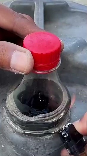 This is a process of installing or adding a funnel to the drum. using pieces of plastic bottles