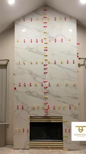 Watch us transform a fireplace with new tile! 🛠️✨ Step-by-step fireplace tiling magic.