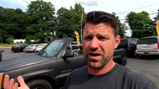 Completing custom convertible conversion on luxury SUV