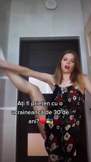 Floral Dress Leg Lifting Demonstration in Domestic Setting