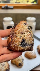 Bakery-Style Blueberry Scones with Vanilla Icing These homemade blueberry scones outshine anything you’ll find at a bakery. Packed with plump, juicy blueberries, they bake up golden and crisp on the edges with irresistibly soft, flaky centers. Each bite delivers that perfect balance of buttery richness and bright berry flavor. While the brief chill before baking is optional, it helps the scones hold their shape and ensures bakery-style results—highly worth the extra 15 minutes. Ingredients - 2 c