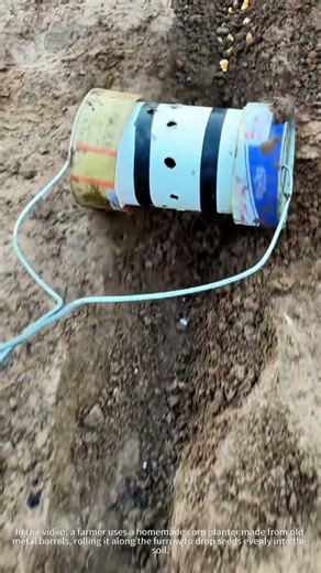 Farmer’s DIY corn planter from old barrels! Planting made easy!