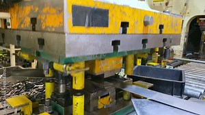 Making press part using hydraulic press machine from iron plate sheet - Manufacturing industrial process