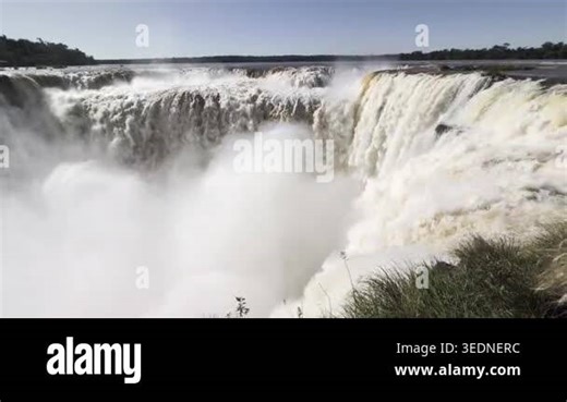 The turbulent waters of Iguazu Falls in Iguazu National Park and Reserve, Argentina, in June Stock Video Footage - Alamy