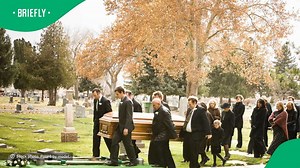 Pallbearers fall into burial hole while carrying a casket, peeps amused