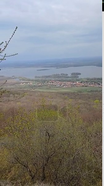 View of the landscape of South Moravia (Palava) and the Novomlynske Reservoir from the ruins of Dvicky Castle Stock Video Footage - Alamy