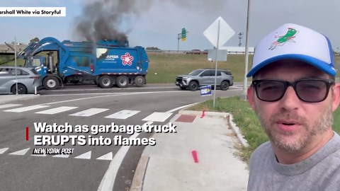 Watch as garbage truck erupts into flames