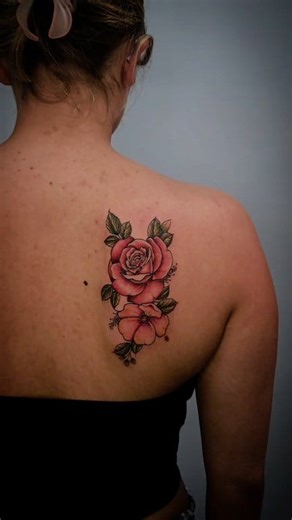 💮 She doesn't have social media, but we showing this off anyways💪 Abby sat like a champ and handled her 1st piece like a breeze. Abby is definitely a rare human. Most people want their first tattoo to be meaningful but as I always tell people, it doesn't have to be that way ...it could be just something you like from an artist who's work you appreciate. She said she wanted any 2 flowers on her back shoulder with red, pink and some yellow . So I made this for her and couldn't be happier with th