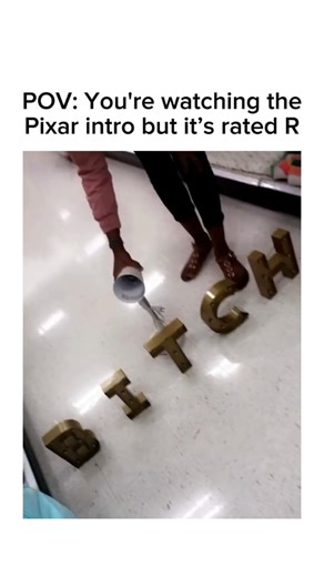 @epicvideosonig on Instagram: "In this short clip, a shopper performs a brilliant, low-budget parody of the Pixar Studios logo. Instead of the classic "P-I-X-A-R" lineup, they use gold decorative letters on a store floor to spell out a bold slur. The person mimics the famous lamp by "hopping" a desk lamp onto the letter 'I' and stomping it flat, perfectly capturing the movement of the animated character in a hilarious, rebellious way. It’s a perfect mix of nostalgia and chaotic "intrusive though