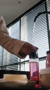 Woman washing face in bathroom | Free Stock Video Footage