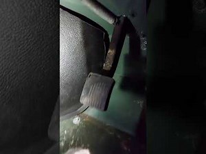 How do you open the hood of the Land Rover Defender?