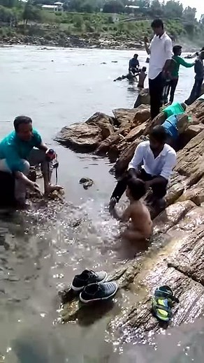 Child bathing in Narmada River