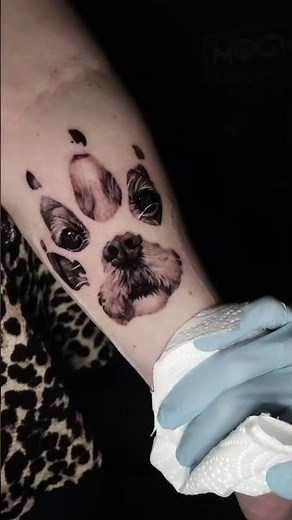 HEARTWARMING DOG PAW PRINT TATTOO WITH AMAZING DETAIL